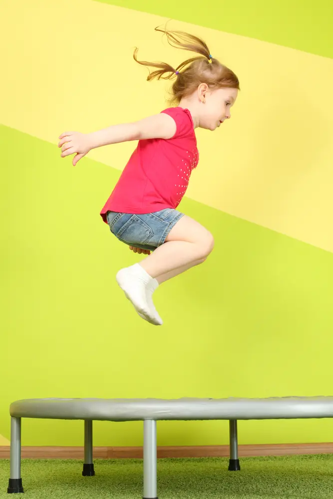 Okanagan Vision Therapy - Little girl jumping on trampoline