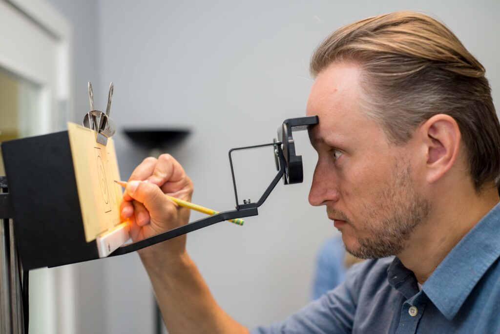 Man going through vision therapy exercises